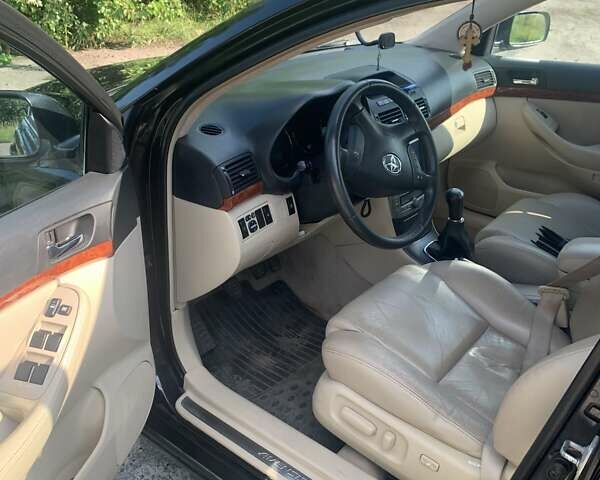 Черный Тойота Авенсис, объемом двигателя 2 л и пробегом 278 тыс. км за 6400 $, фото 3 на Automoto.ua