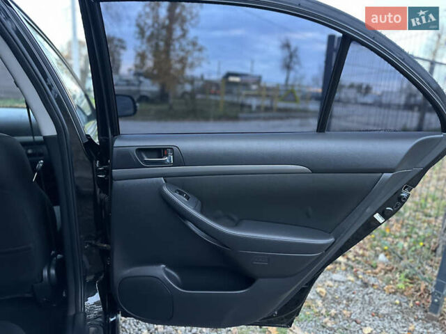Чорний Тойота Авенсіс, об'ємом двигуна 2 л та пробігом 264 тис. км за 7500 $, фото 48 на Automoto.ua