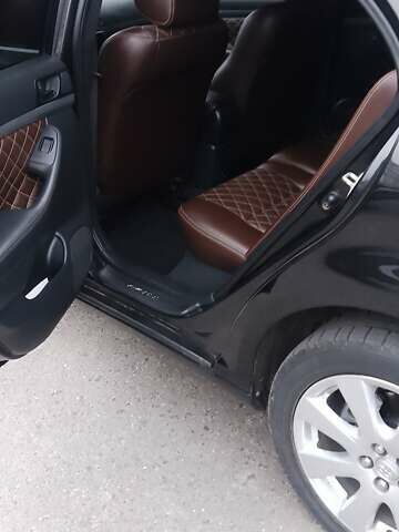 Черный Тойота Авенсис, объемом двигателя 2 л и пробегом 278 тыс. км за 6300 $, фото 15 на Automoto.ua