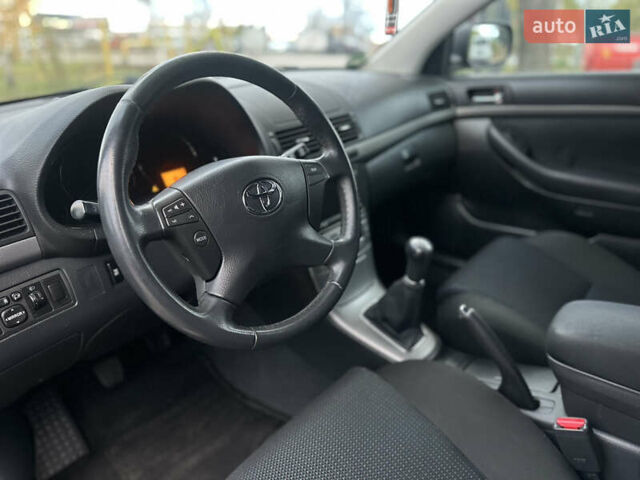 Чорний Тойота Авенсіс, об'ємом двигуна 2 л та пробігом 264 тис. км за 7500 $, фото 24 на Automoto.ua