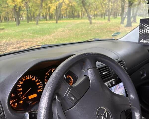 Черный Тойота Авенсис, объемом двигателя 2 л и пробегом 235 тыс. км за 6000 $, фото 5 на Automoto.ua