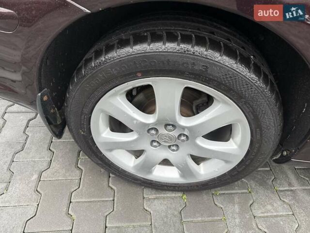 Коричневый Тойота Авенсис, объемом двигателя 2 л и пробегом 139 тыс. км за 8600 $, фото 6 на Automoto.ua