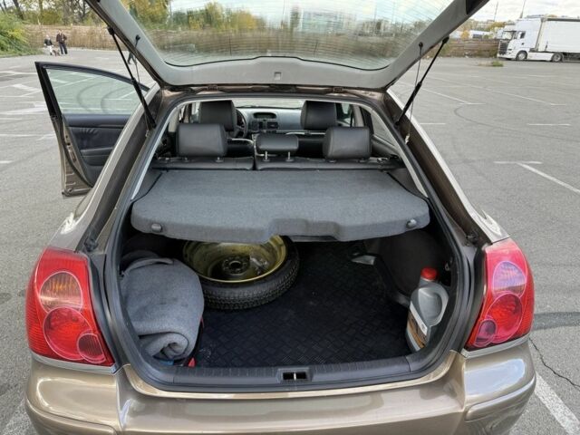 Коричневий Тойота Авенсіс, об'ємом двигуна 2 л та пробігом 370 тис. км за 6500 $, фото 12 на Automoto.ua