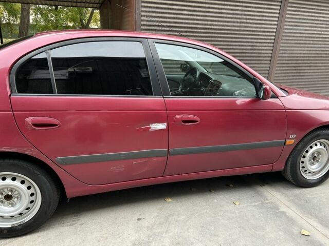 Красный Тойота Авенсис, объемом двигателя 1.8 л и пробегом 306 тыс. км за 3500 $, фото 9 на Automoto.ua