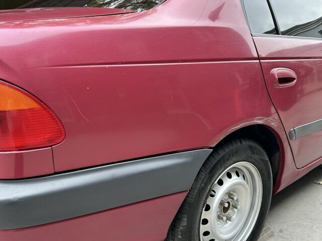 Красный Тойота Авенсис, объемом двигателя 1.8 л и пробегом 306 тыс. км за 3500 $, фото 8 на Automoto.ua