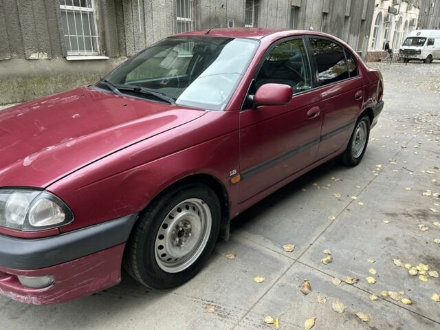 Красный Тойота Авенсис, объемом двигателя 1.8 л и пробегом 306 тыс. км за 3500 $, фото 5 на Automoto.ua