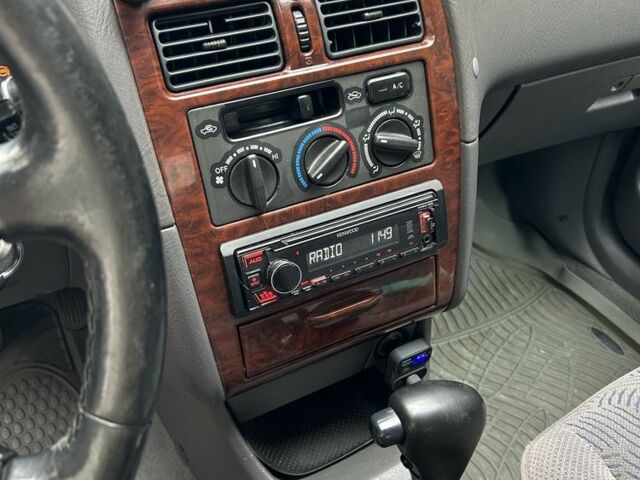 Красный Тойота Авенсис, объемом двигателя 1.8 л и пробегом 306 тыс. км за 3500 $, фото 3 на Automoto.ua