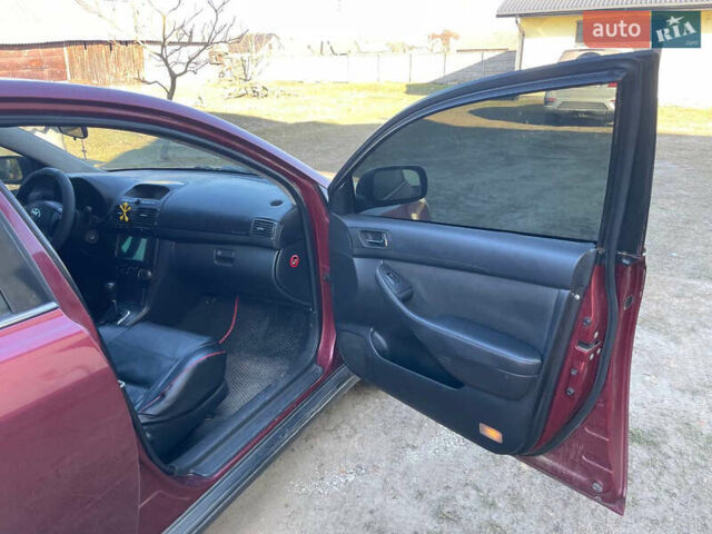 Червоний Тойота Авенсіс, об'ємом двигуна 1.8 л та пробігом 170 тис. км за 5200 $, фото 7 на Automoto.ua