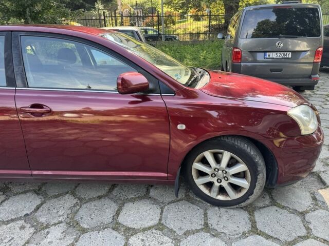 Червоний Тойота Авенсіс, об'ємом двигуна 2 л та пробігом 322 тис. км за 2450 $, фото 4 на Automoto.ua