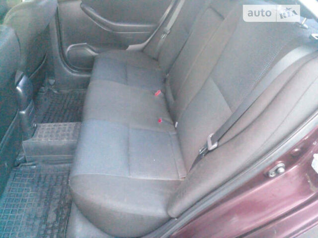 Красный Тойота Авенсис, объемом двигателя 1.8 л и пробегом 275 тыс. км за 7200 $, фото 15 на Automoto.ua