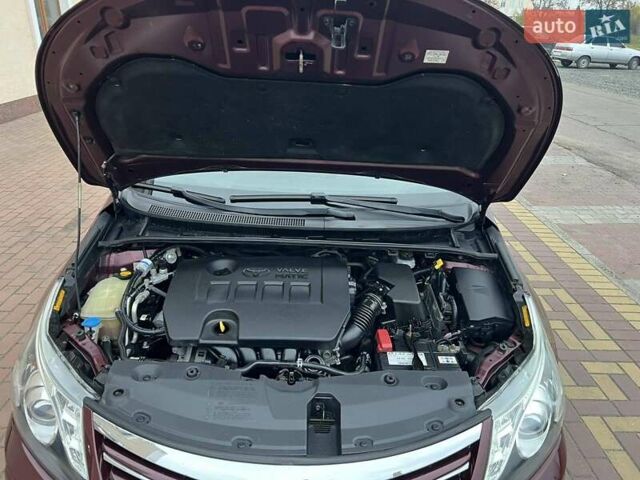 Красный Тойота Авенсис, объемом двигателя 2 л и пробегом 220 тыс. км за 10490 $, фото 13 на Automoto.ua