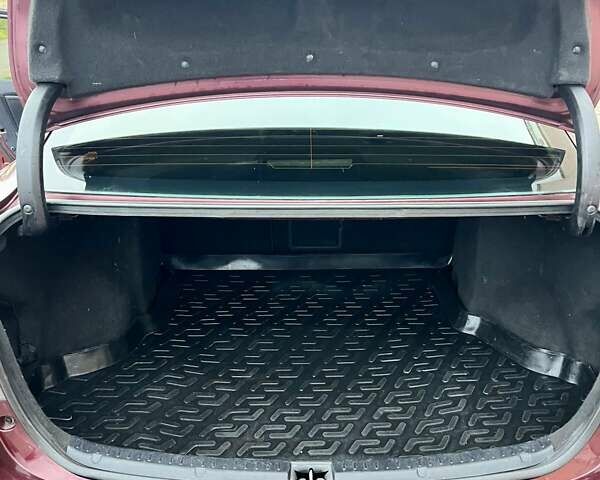 Красный Тойота Авенсис, объемом двигателя 2 л и пробегом 220 тыс. км за 10490 $, фото 14 на Automoto.ua