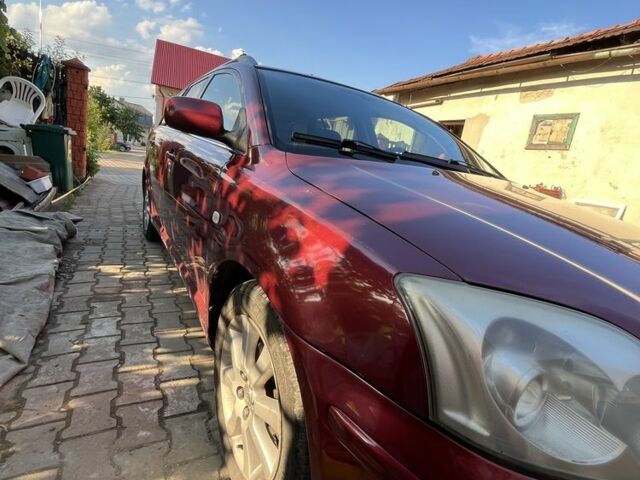 Красный Тойота Авенсис, объемом двигателя 1.8 л и пробегом 325 тыс. км за 4200 $, фото 3 на Automoto.ua