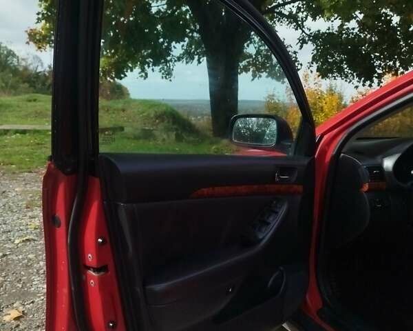 Красный Тойота Авенсис, объемом двигателя 2 л и пробегом 467 тыс. км за 4700 $, фото 6 на Automoto.ua