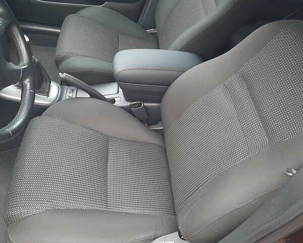 Червоний Тойота Авенсіс, об'ємом двигуна 2 л та пробігом 232 тис. км за 7300 $, фото 17 на Automoto.ua