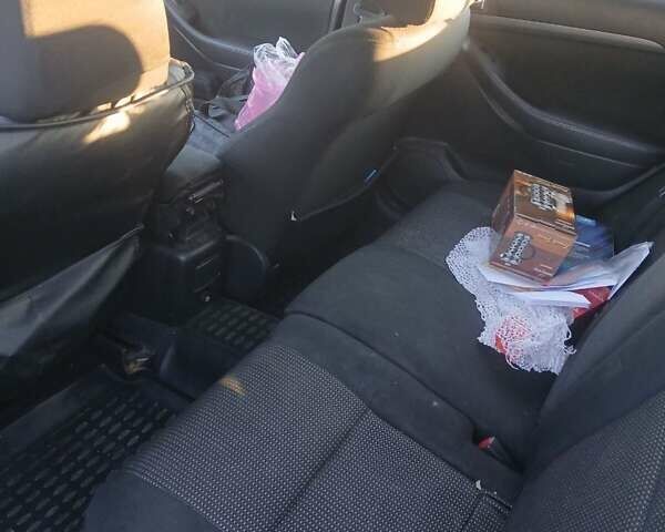 Тойота Авенсіс, об'ємом двигуна 2 л та пробігом 438 тис. км за 5700 $, фото 4 на Automoto.ua