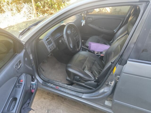 Серый Тойота Авенсис, объемом двигателя 2 л и пробегом 350 тыс. км за 2400 $, фото 3 на Automoto.ua