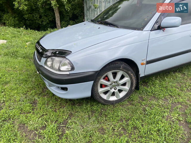 Серый Тойота Авенсис, объемом двигателя 1.8 л и пробегом 393 тыс. км за 3501 $, фото 2 на Automoto.ua