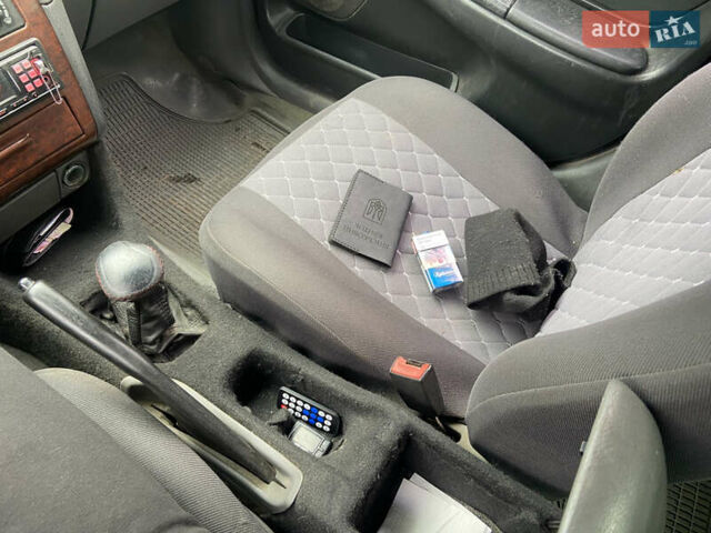 Серый Тойота Авенсис, объемом двигателя 1.8 л и пробегом 393 тыс. км за 3501 $, фото 12 на Automoto.ua