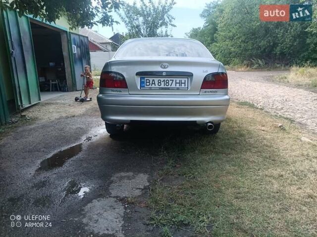 Серый Тойота Авенсис, объемом двигателя 1.76 л и пробегом 450 тыс. км за 3800 $, фото 1 на Automoto.ua