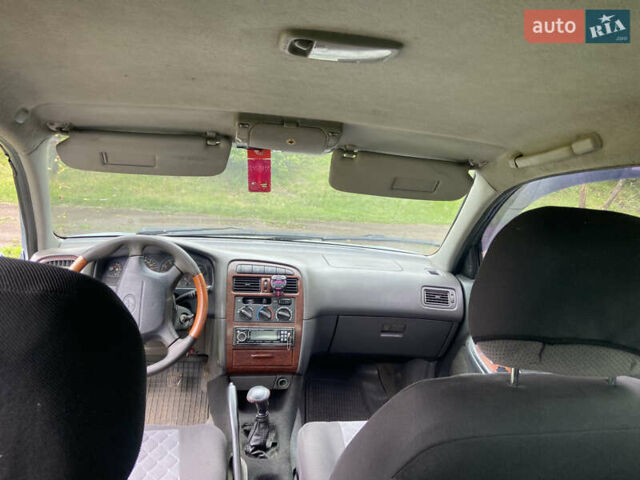 Серый Тойота Авенсис, объемом двигателя 1.8 л и пробегом 393 тыс. км за 3501 $, фото 14 на Automoto.ua