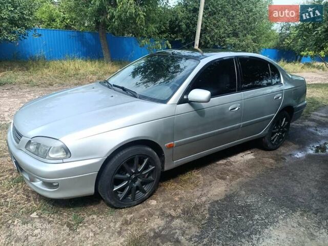 Серый Тойота Авенсис, объемом двигателя 1.76 л и пробегом 450 тыс. км за 3800 $, фото 4 на Automoto.ua