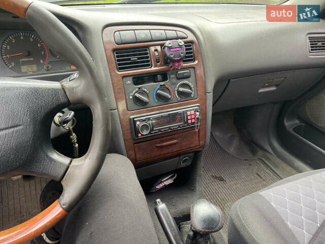 Серый Тойота Авенсис, объемом двигателя 1.8 л и пробегом 393 тыс. км за 3501 $, фото 11 на Automoto.ua