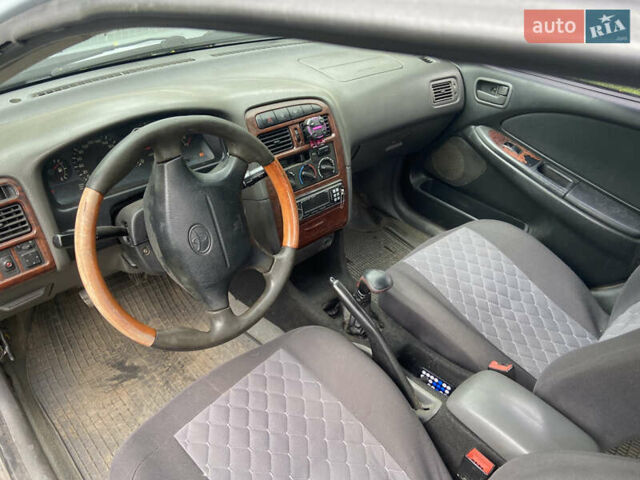 Серый Тойота Авенсис, объемом двигателя 1.8 л и пробегом 393 тыс. км за 3501 $, фото 16 на Automoto.ua