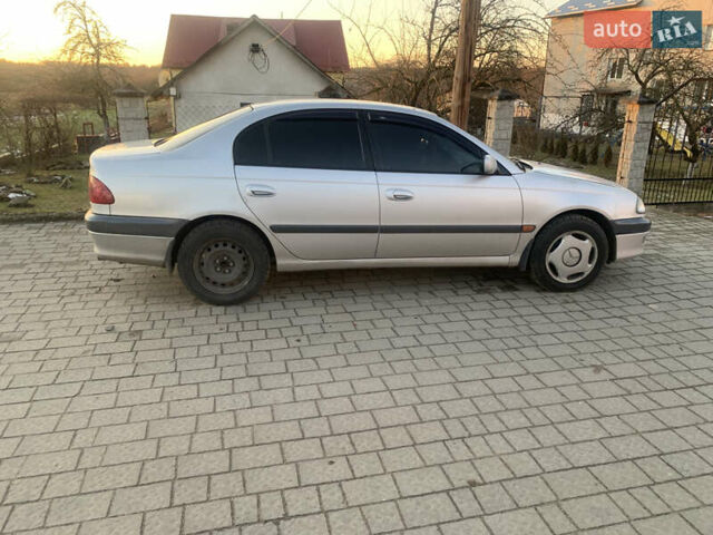 Серый Тойота Авенсис, объемом двигателя 1.6 л и пробегом 412 тыс. км за 2700 $, фото 4 на Automoto.ua