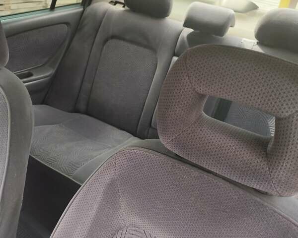 Серый Тойота Авенсис, объемом двигателя 1.76 л и пробегом 350 тыс. км за 3499 $, фото 4 на Automoto.ua