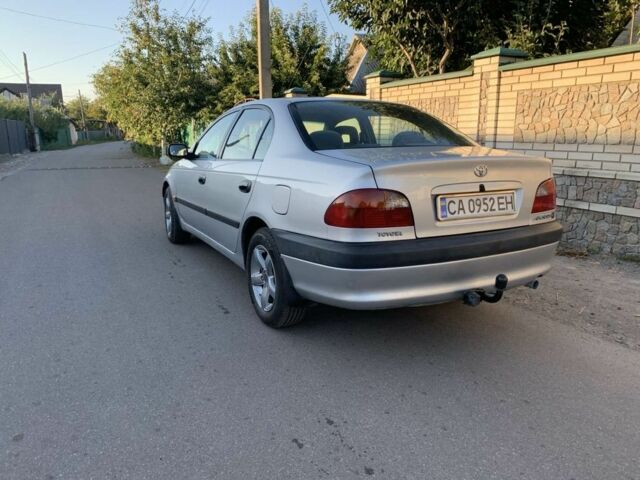 Серый Тойота Авенсис, объемом двигателя 1.8 л и пробегом 217 тыс. км за 3800 $, фото 4 на Automoto.ua