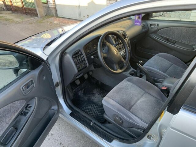 Серый Тойота Авенсис, объемом двигателя 1.8 л и пробегом 217 тыс. км за 3800 $, фото 7 на Automoto.ua