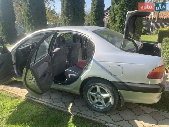 Серый Тойота Авенсис, объемом двигателя 1.8 л и пробегом 270 тыс. км за 3000 $, фото 4 на Automoto.ua