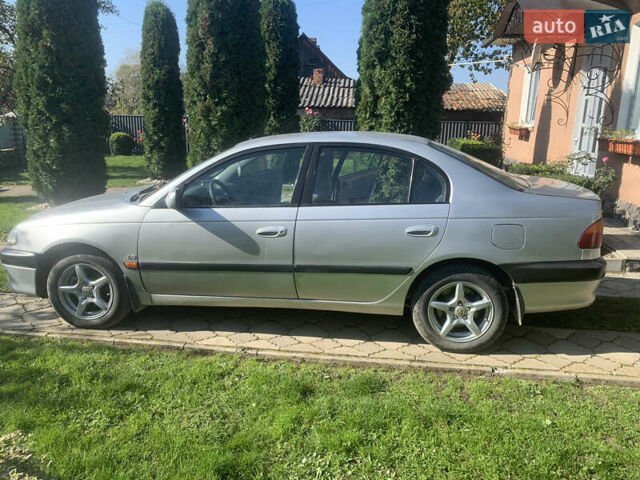 Серый Тойота Авенсис, объемом двигателя 1.8 л и пробегом 270 тыс. км за 3000 $, фото 2 на Automoto.ua