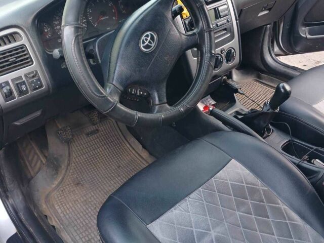 Серый Тойота Авенсис, объемом двигателя 2 л и пробегом 376 тыс. км за 2610 $, фото 3 на Automoto.ua