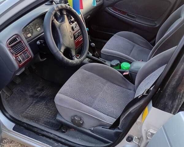 Серый Тойота Авенсис, объемом двигателя 1.76 л и пробегом 432 тыс. км за 3000 $, фото 3 на Automoto.ua