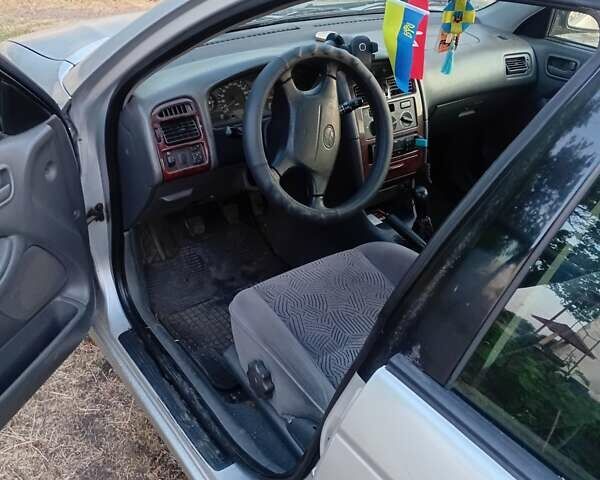 Серый Тойота Авенсис, объемом двигателя 1.76 л и пробегом 432 тыс. км за 3000 $, фото 1 на Automoto.ua