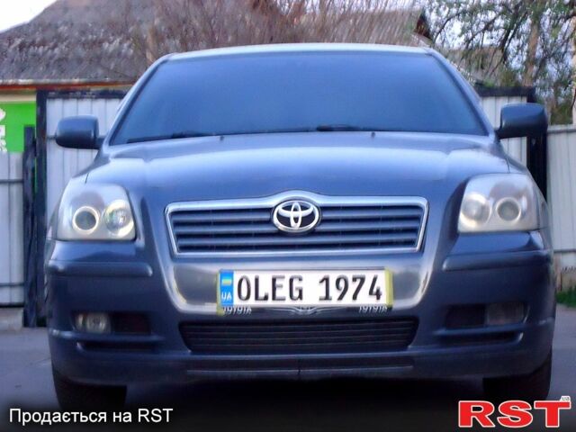 Серый Тойота Авенсис, объемом двигателя 1.6 л и пробегом 312 тыс. км за 5000 $, фото 1 на Automoto.ua