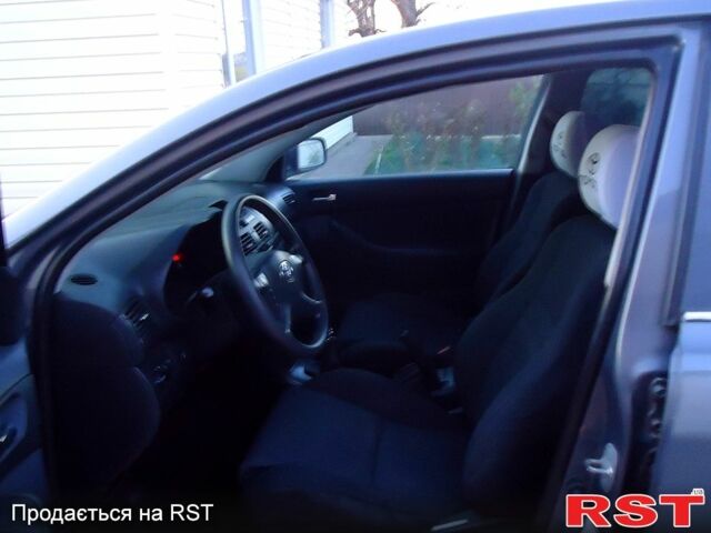 Серый Тойота Авенсис, объемом двигателя 1.6 л и пробегом 312 тыс. км за 5000 $, фото 3 на Automoto.ua