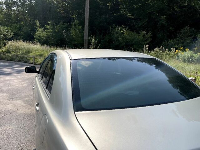 Серый Тойота Авенсис, объемом двигателя 1.8 л и пробегом 235 тыс. км за 5180 $, фото 3 на Automoto.ua