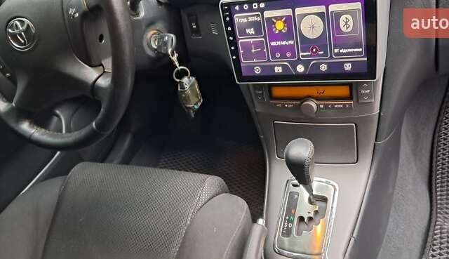 Серый Тойота Авенсис, объемом двигателя 2 л и пробегом 243 тыс. км за 5999 $, фото 6 на Automoto.ua