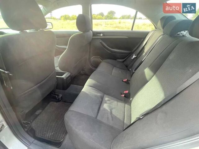 Серый Тойота Авенсис, объемом двигателя 1.6 л и пробегом 245 тыс. км за 4000 $, фото 11 на Automoto.ua