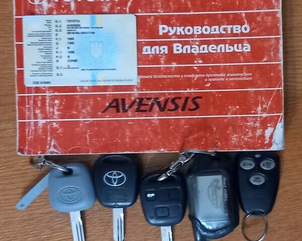 Серый Тойота Авенсис, объемом двигателя 2 л и пробегом 243 тыс. км за 5999 $, фото 4 на Automoto.ua
