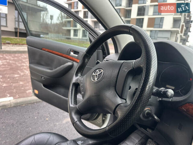 Серый Тойота Авенсис, объемом двигателя 2 л и пробегом 250 тыс. км за 4650 $, фото 48 на Automoto.ua