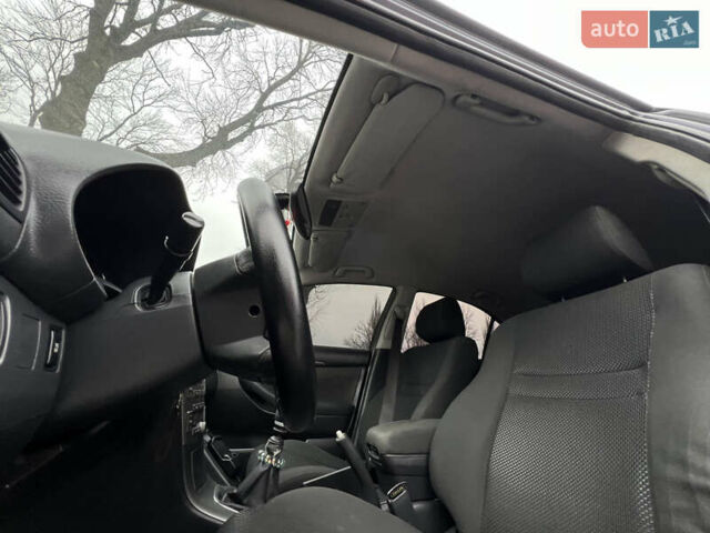 Серый Тойота Авенсис, объемом двигателя 2.23 л и пробегом 337 тыс. км за 5777 $, фото 25 на Automoto.ua