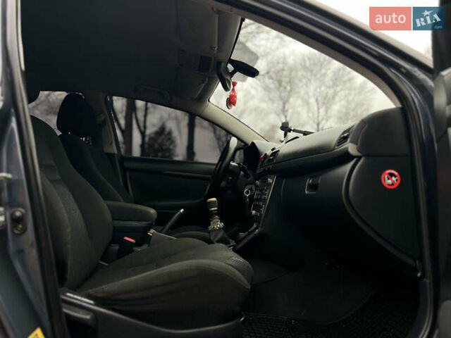 Серый Тойота Авенсис, объемом двигателя 2.23 л и пробегом 337 тыс. км за 5777 $, фото 42 на Automoto.ua