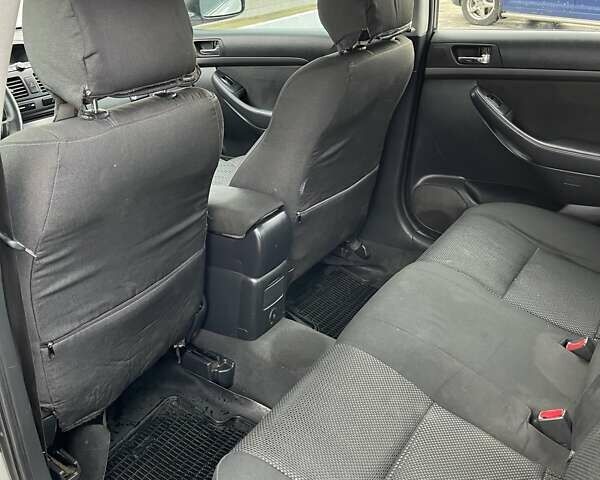 Серый Тойота Авенсис, объемом двигателя 2 л и пробегом 371 тыс. км за 5500 $, фото 25 на Automoto.ua