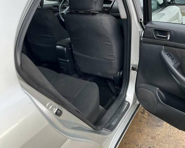 Серый Тойота Авенсис, объемом двигателя 2 л и пробегом 371 тыс. км за 5500 $, фото 9 на Automoto.ua