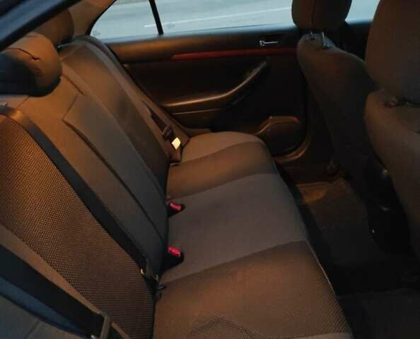 Серый Тойота Авенсис, объемом двигателя 1.79 л и пробегом 240 тыс. км за 6200 $, фото 2 на Automoto.ua