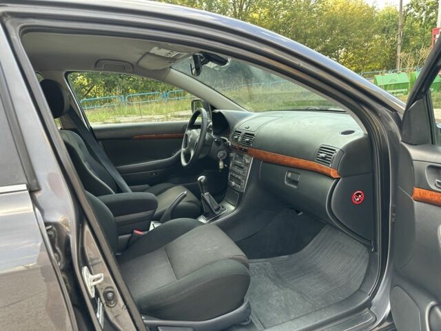 Серый Тойота Авенсис, объемом двигателя 2 л и пробегом 210 тыс. км за 6600 $, фото 10 на Automoto.ua